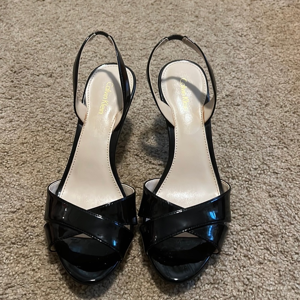 Black designer sandal with heel